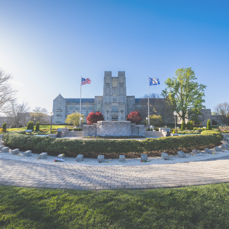 Photo of Burruss and the April 16th memorial outside of Burruss.